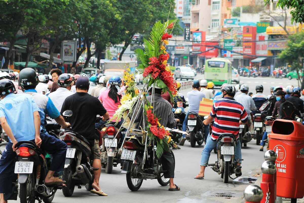 A scene from the busy streets of Ho Chi Minh City, Vietnam. Photo by Leonie Clough on Unsplash