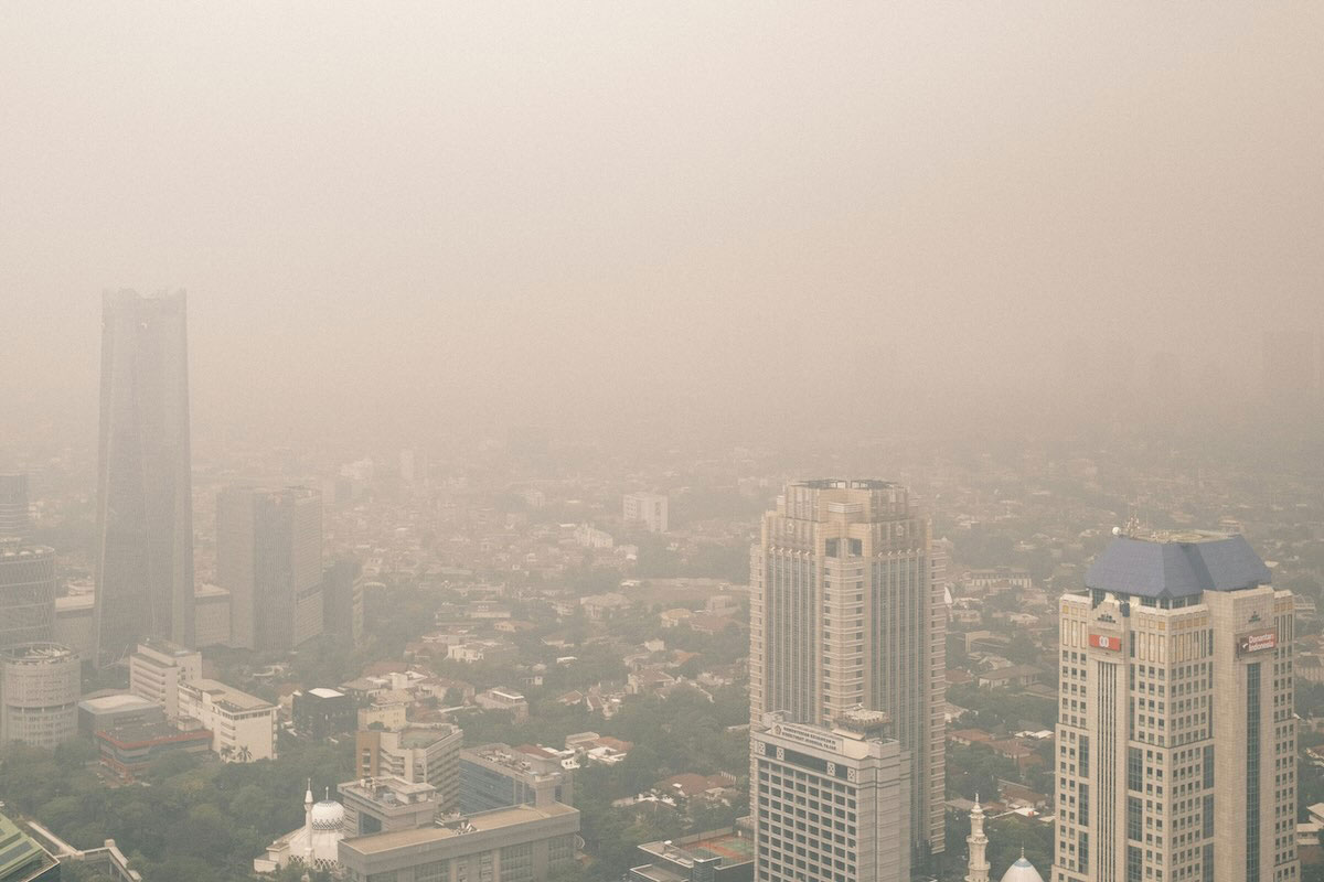 Smog over Jakarta, Indonesia. Photo by David Kristianto on Unsplash