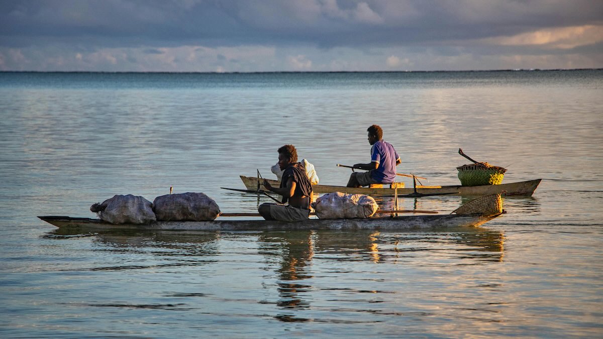 Traditional canoe fishing in Papua New Guinea. Photo by Alex Fanaso on Pexels