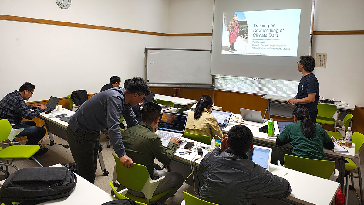 Dr. Yuji Masutomi (NIES) and participants from Bhutan during the training session.